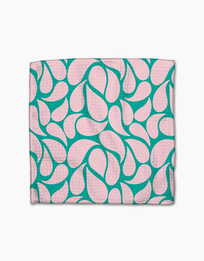 Green and light pink dishcloth on white background