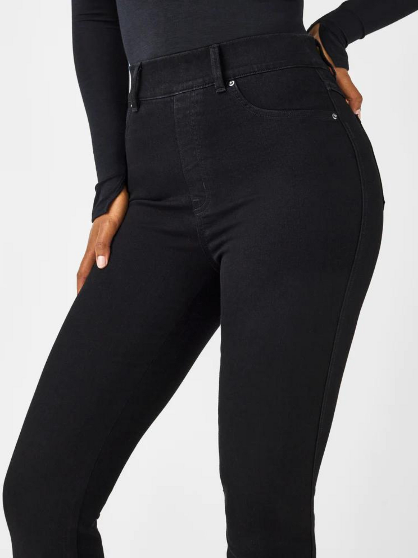Spanx Black Flare Jeans up close front view.