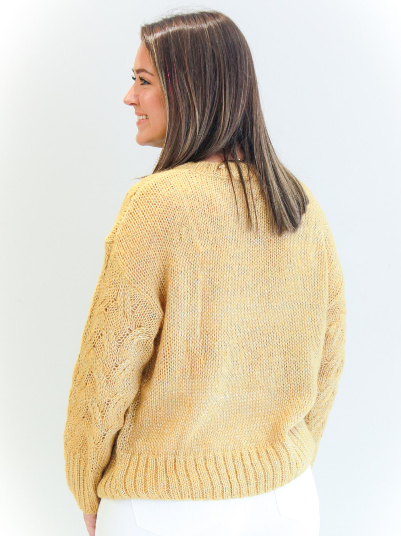 Gold Cable Knit Sweater back view.