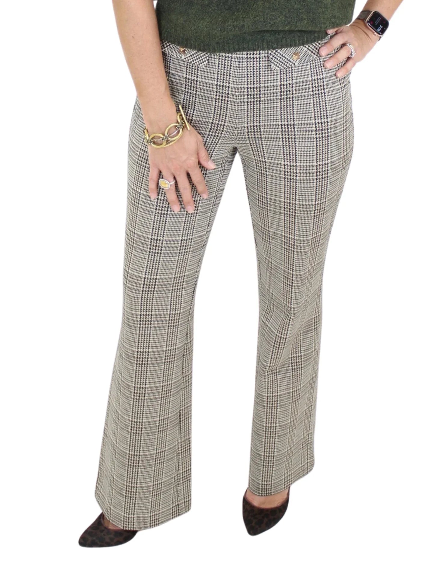 Plaid pants worn by a person on a white background