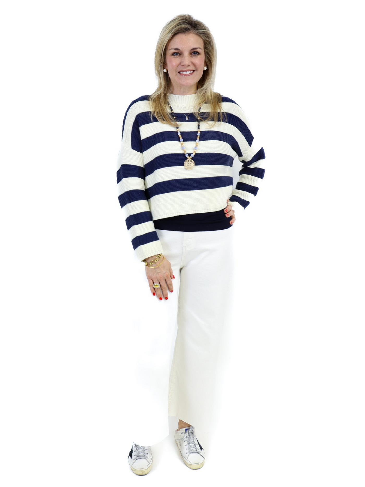 Stripe Knit Sweater - Navy with white jeans.