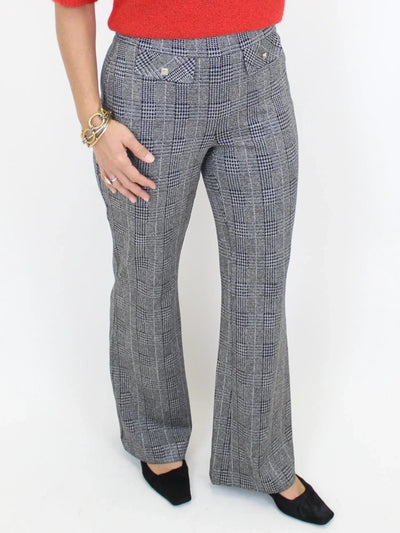 Charcoal plaid pants up close on model.