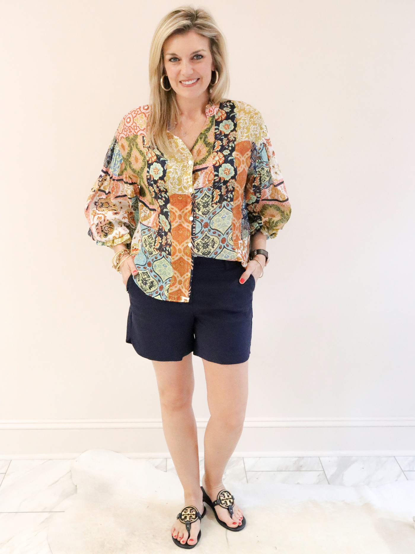 Navy Jade shorts with patchwork blouse.