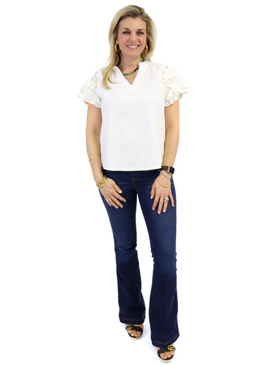 THML Ruffle Sleeve Top - White front view with Spanx Jeans