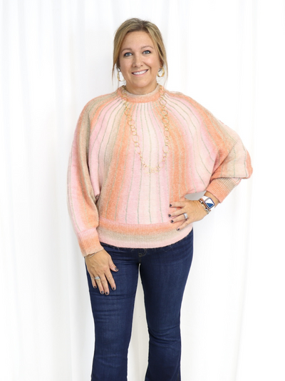 Pink and Gold Burst Sweater front view.