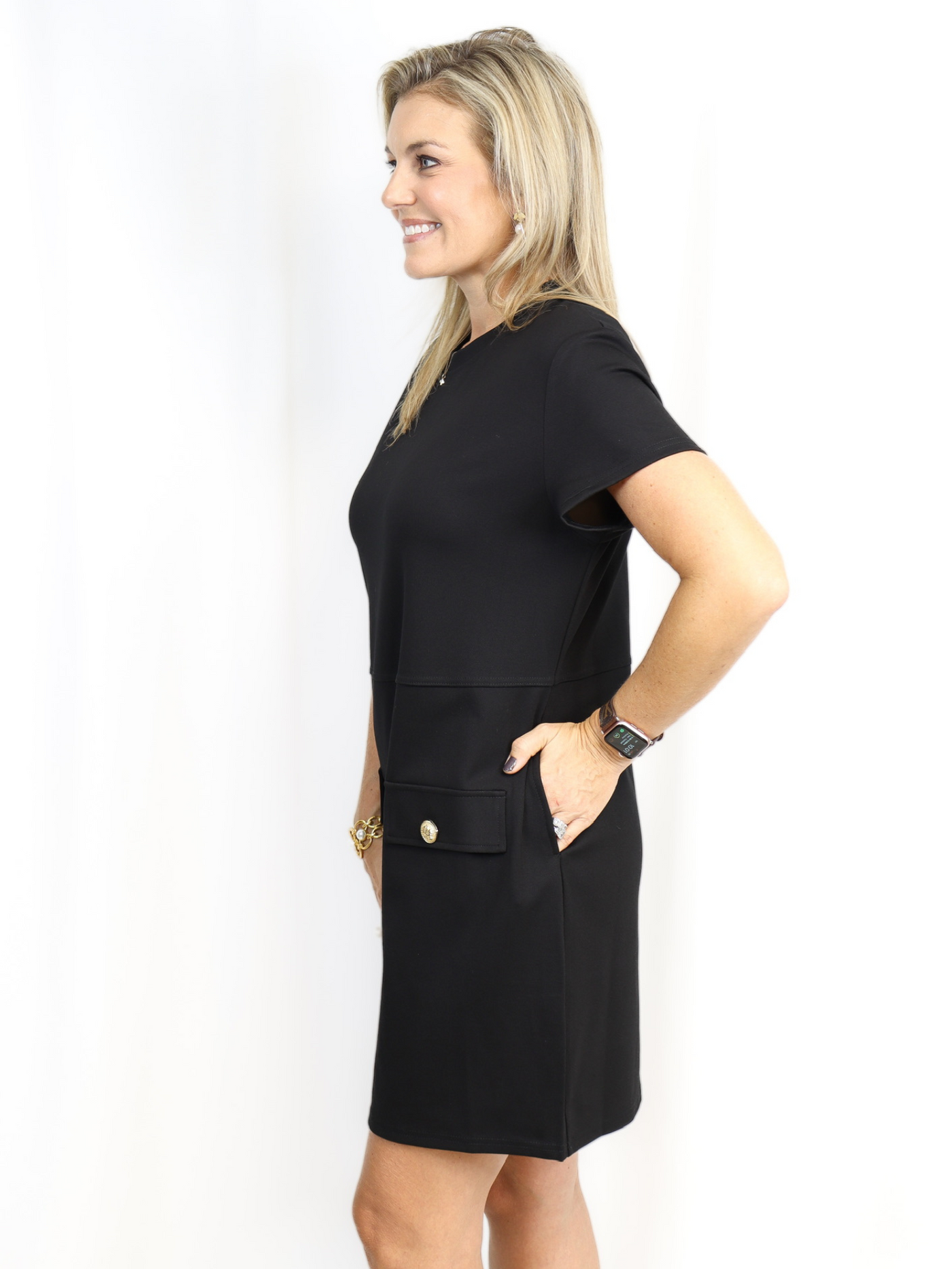 Black Shift Dress with Gold Buttons displaying side pocket