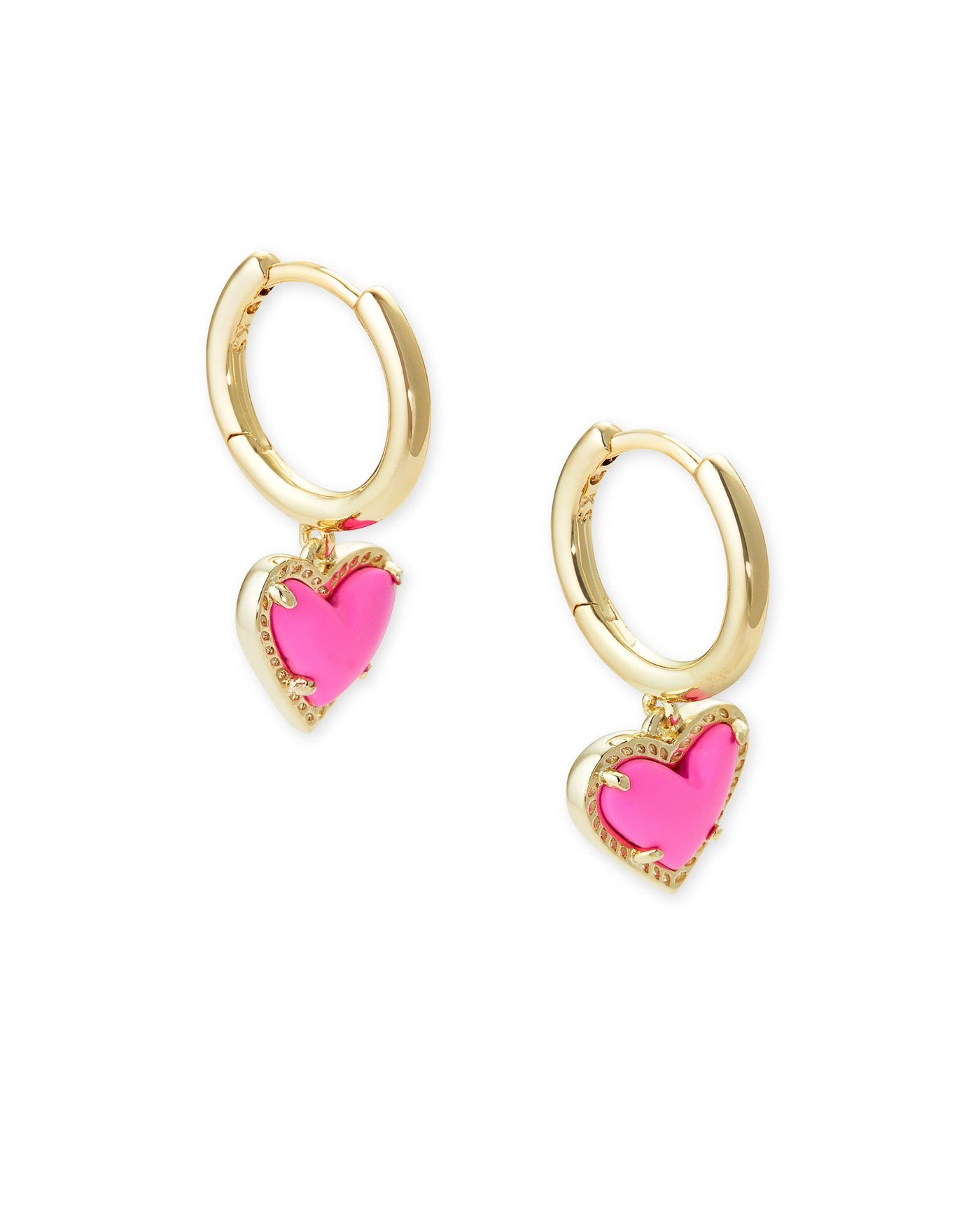 Ari Heart Huggie Hoops Gold Magenta on white background, front view.