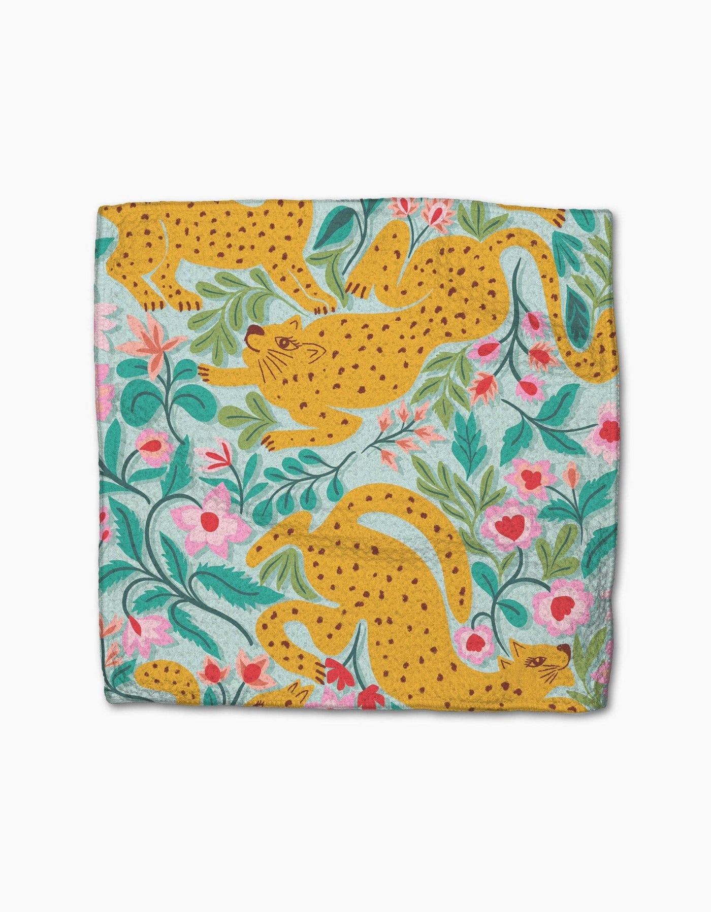 Green dishcloth with pink florals and cheetahs on a white background