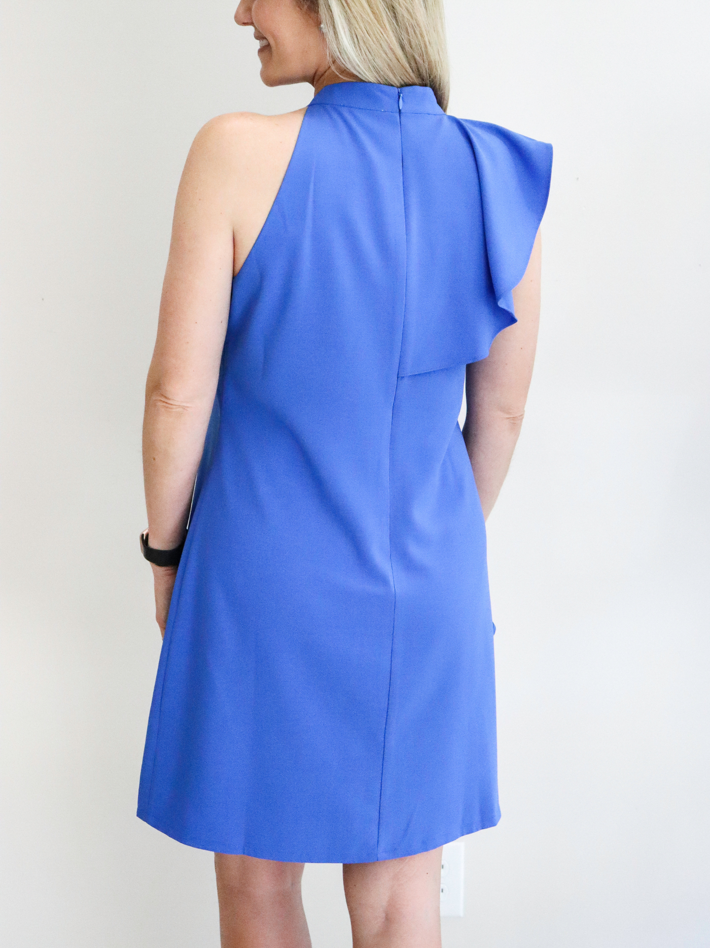 Blue One Sleeve Ruffle Dress back view.