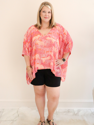 Plus Black High Waisted Shorts front view paired with a pink and orange Molly Bracken top.
