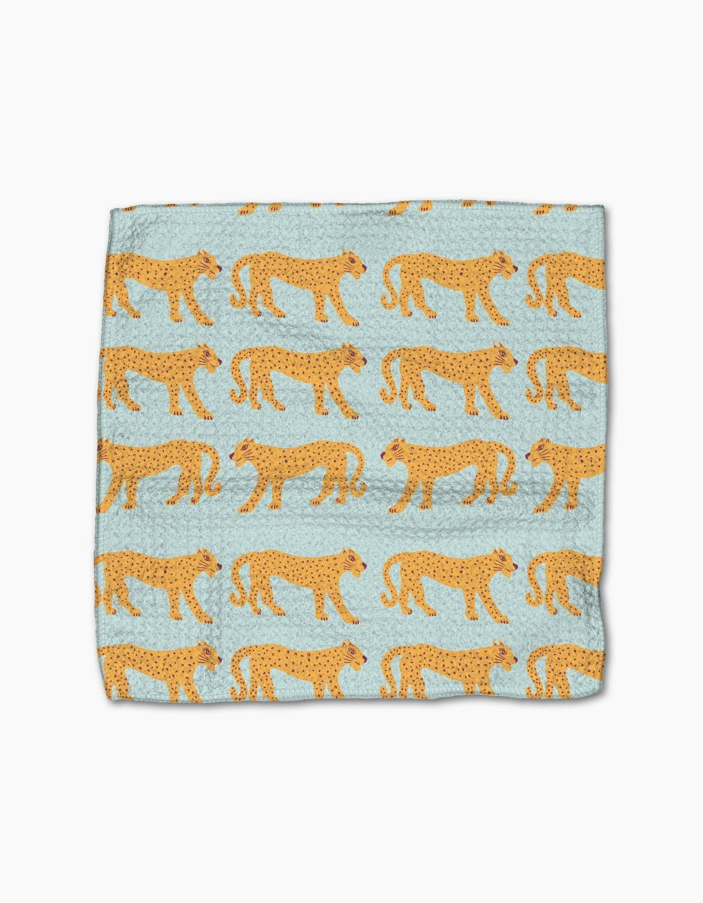 Light green dishcloth with cheetahs on white background