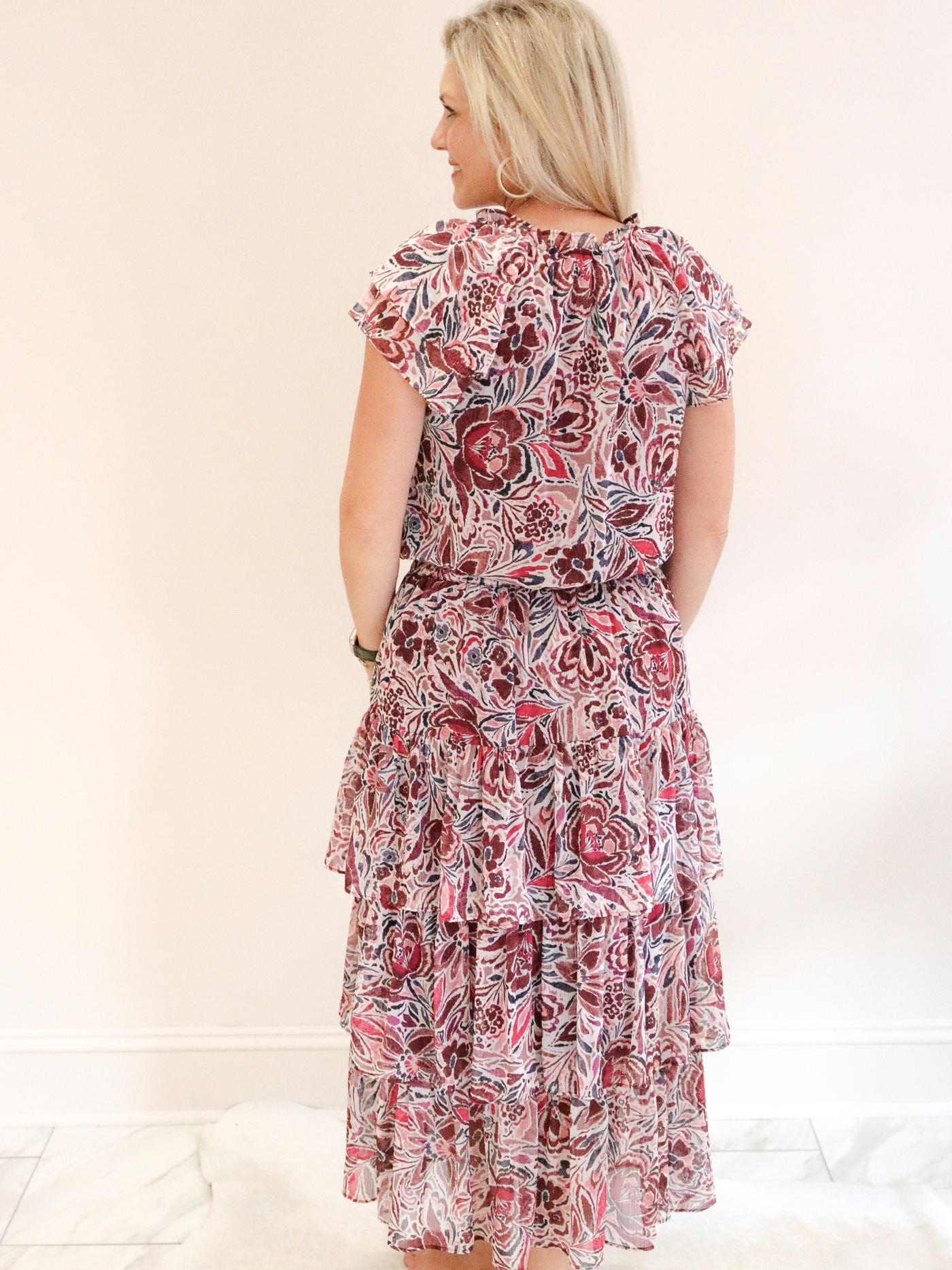 Orchid Floral Ruffle Midi Skirt back view with matching shirt.