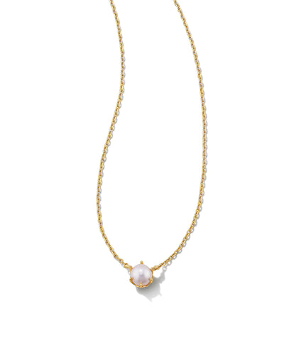 Kendra Scott Ashton Pearl Pendant Necklace Gold on white background closeup.