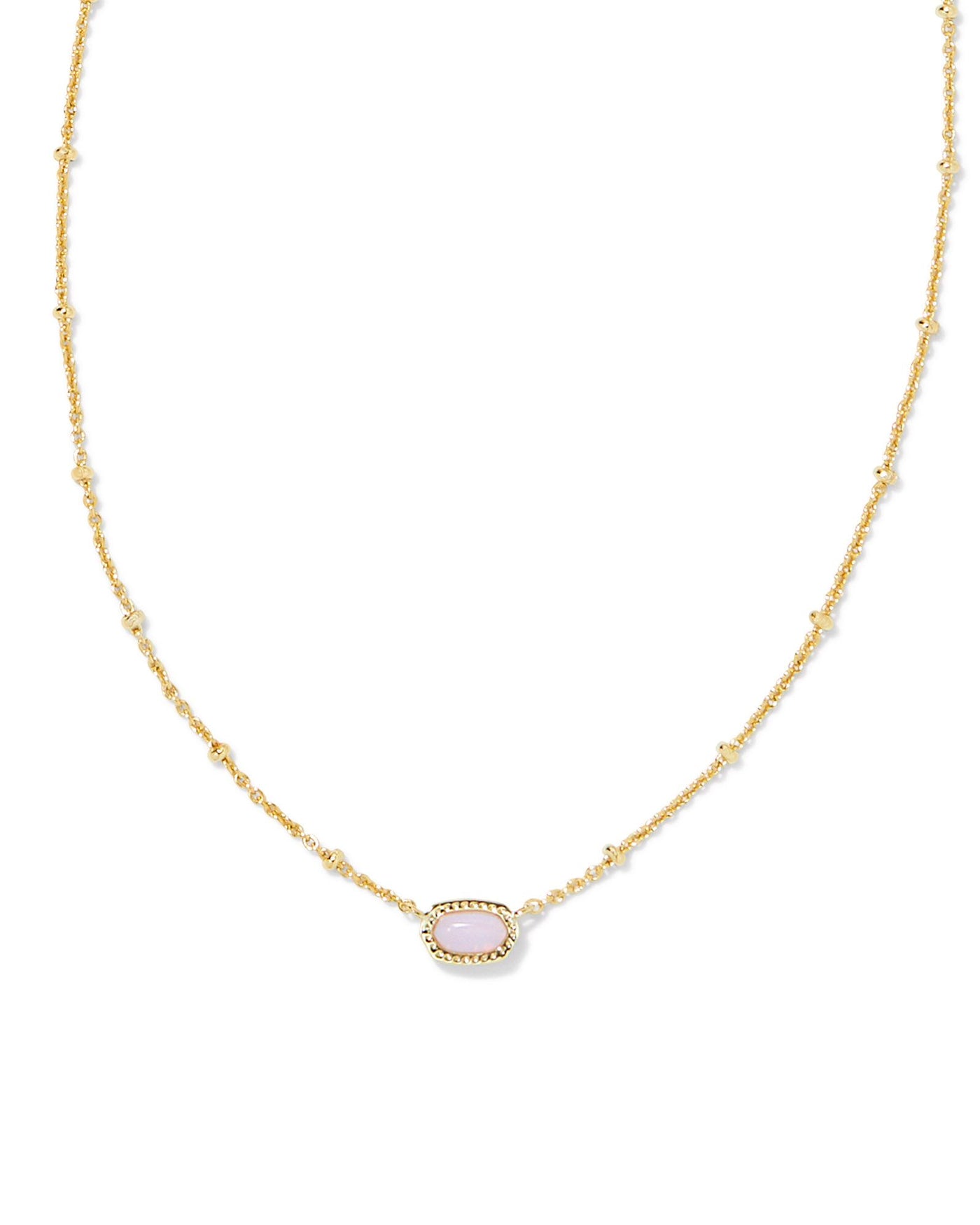 Kendra Scott Mini Elisa Satellite Necklace in Gold Pink Opalite Crystal close up.