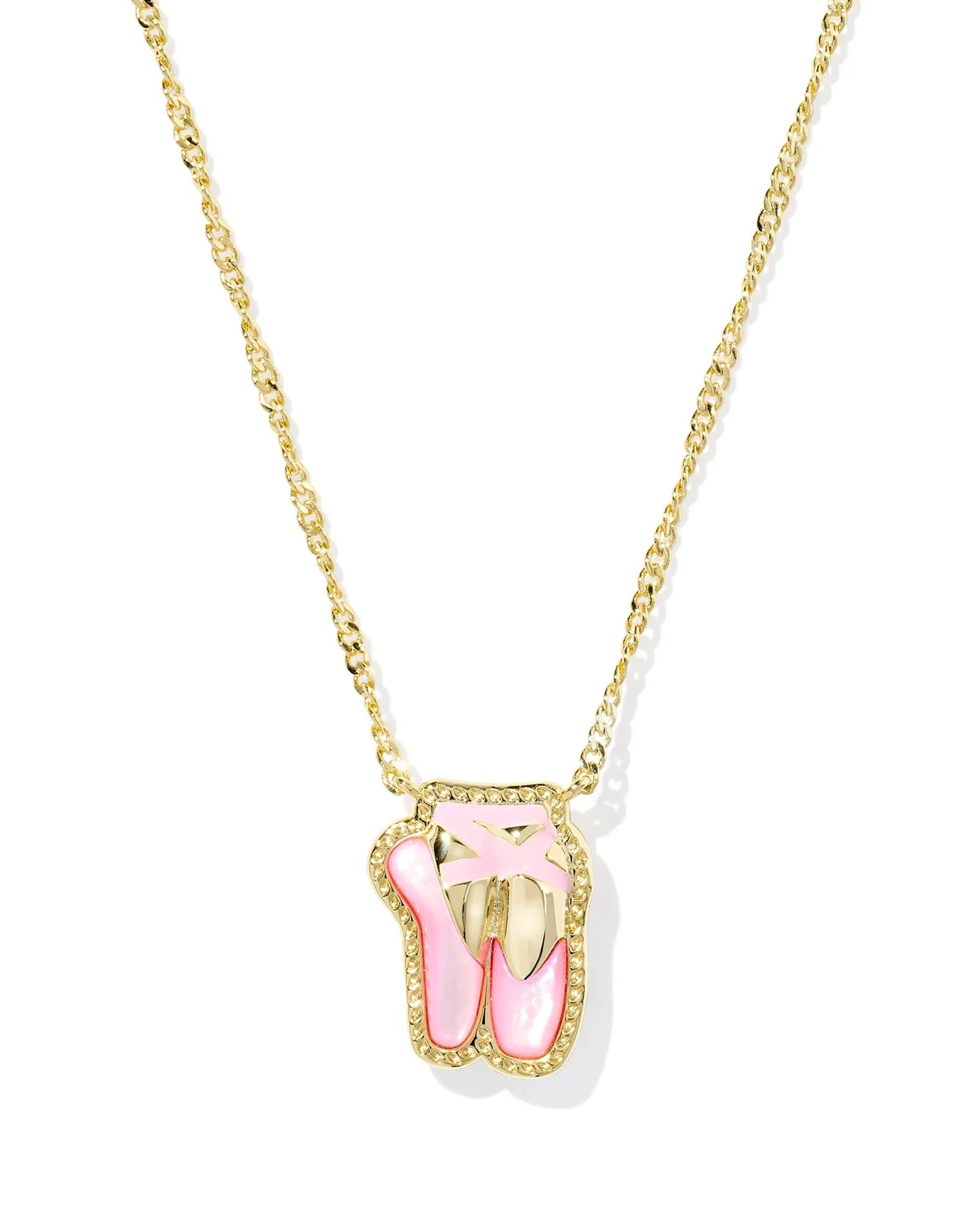 Gold necklace with a pink and gold ballet slipper pendant on a white background, closeup.