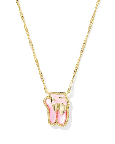 Gold necklace with a pink and gold ballet slipper pendant on a white background, closeup.