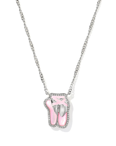 Silver necklace with a pink ballet slipper pendant on a white background, closeup.