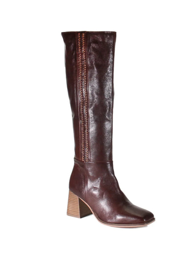 Brown leather knee-high boot with a wooden heel on a white background.