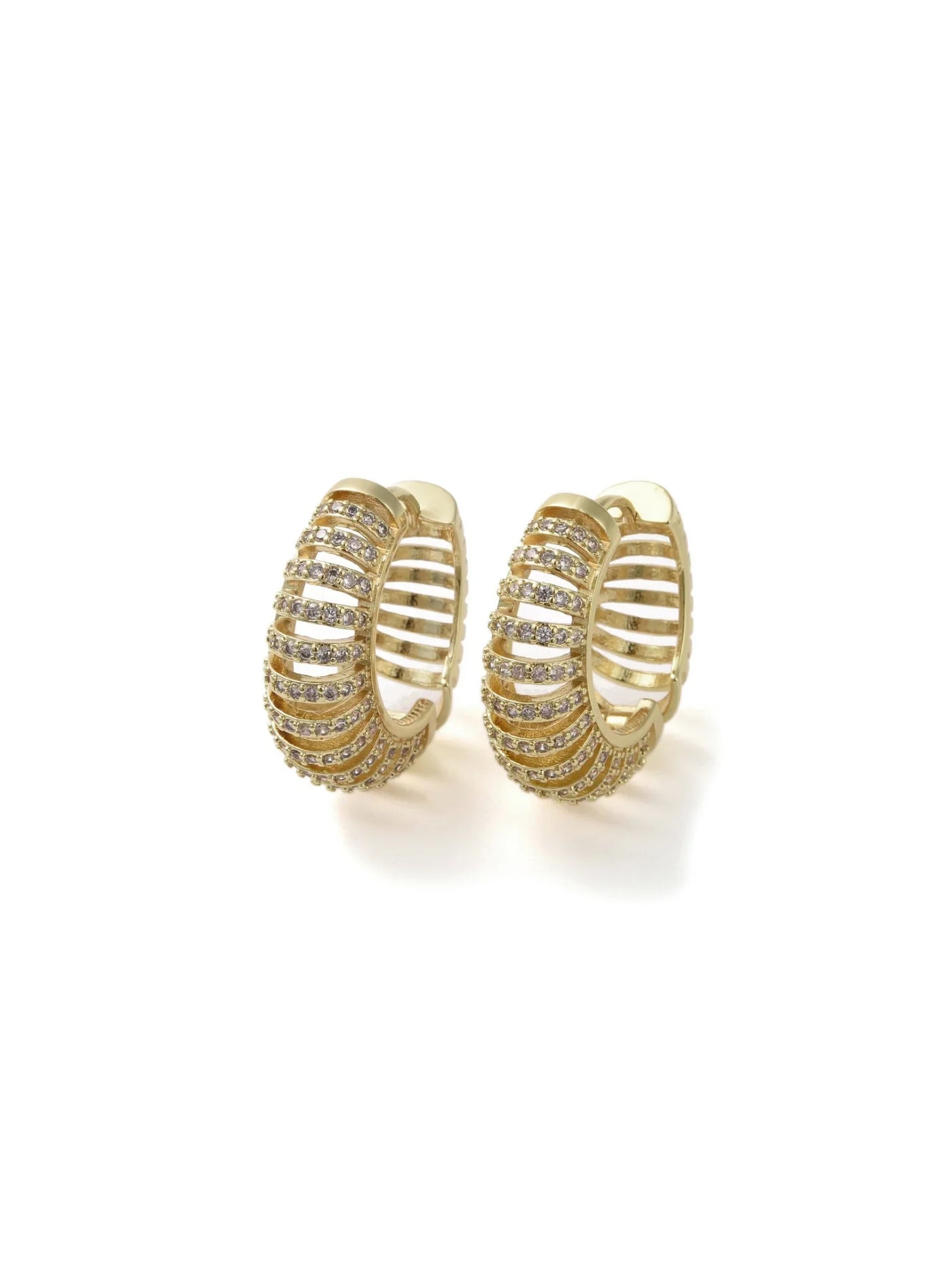 Pair of old pave tele cord hoops on white background.