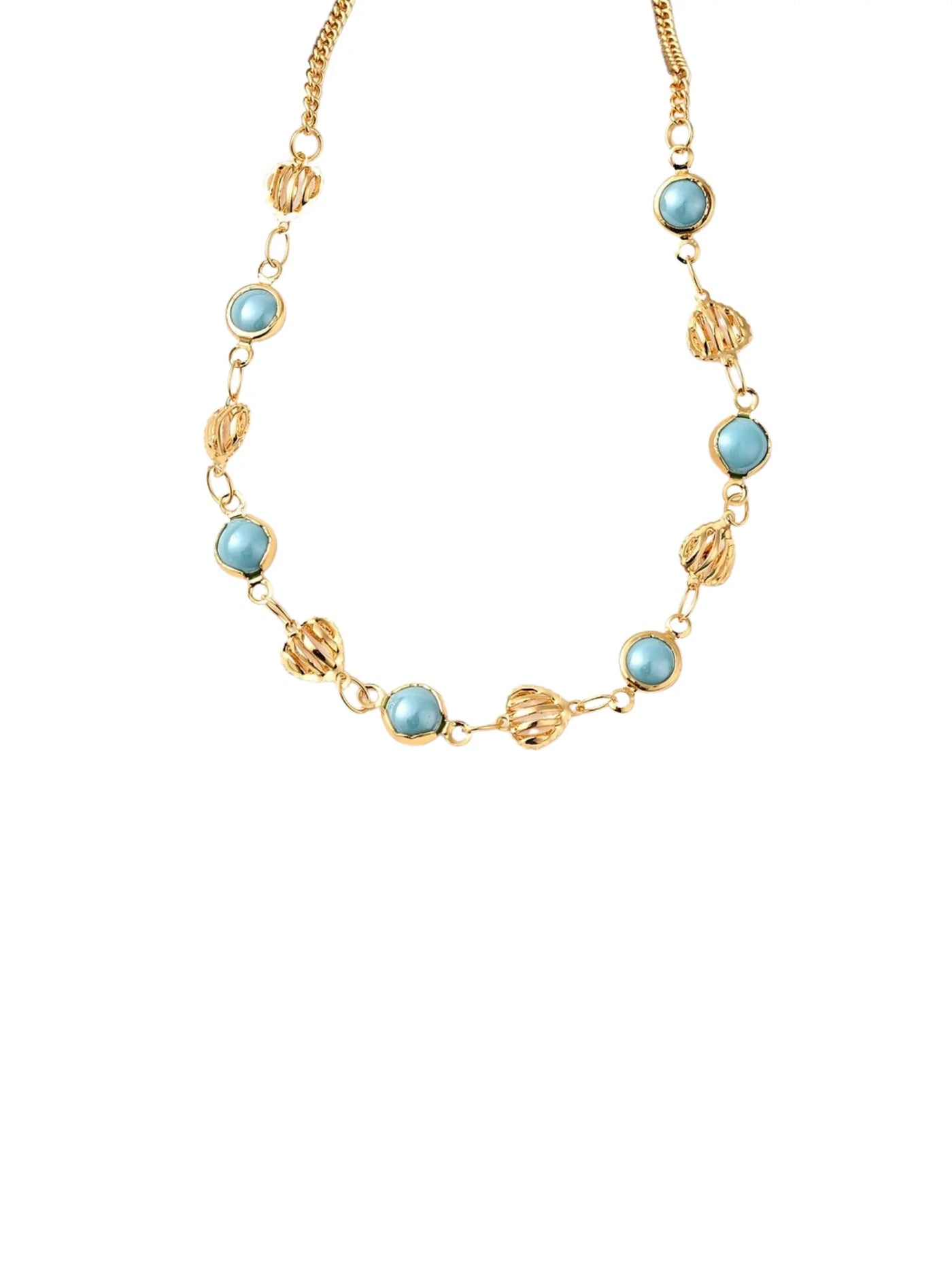 Gold necklace with turquoise and gold beads on white background, closeup.