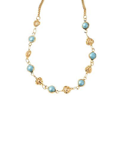 Gold necklace with turquoise and gold beads on white background, closeup.
