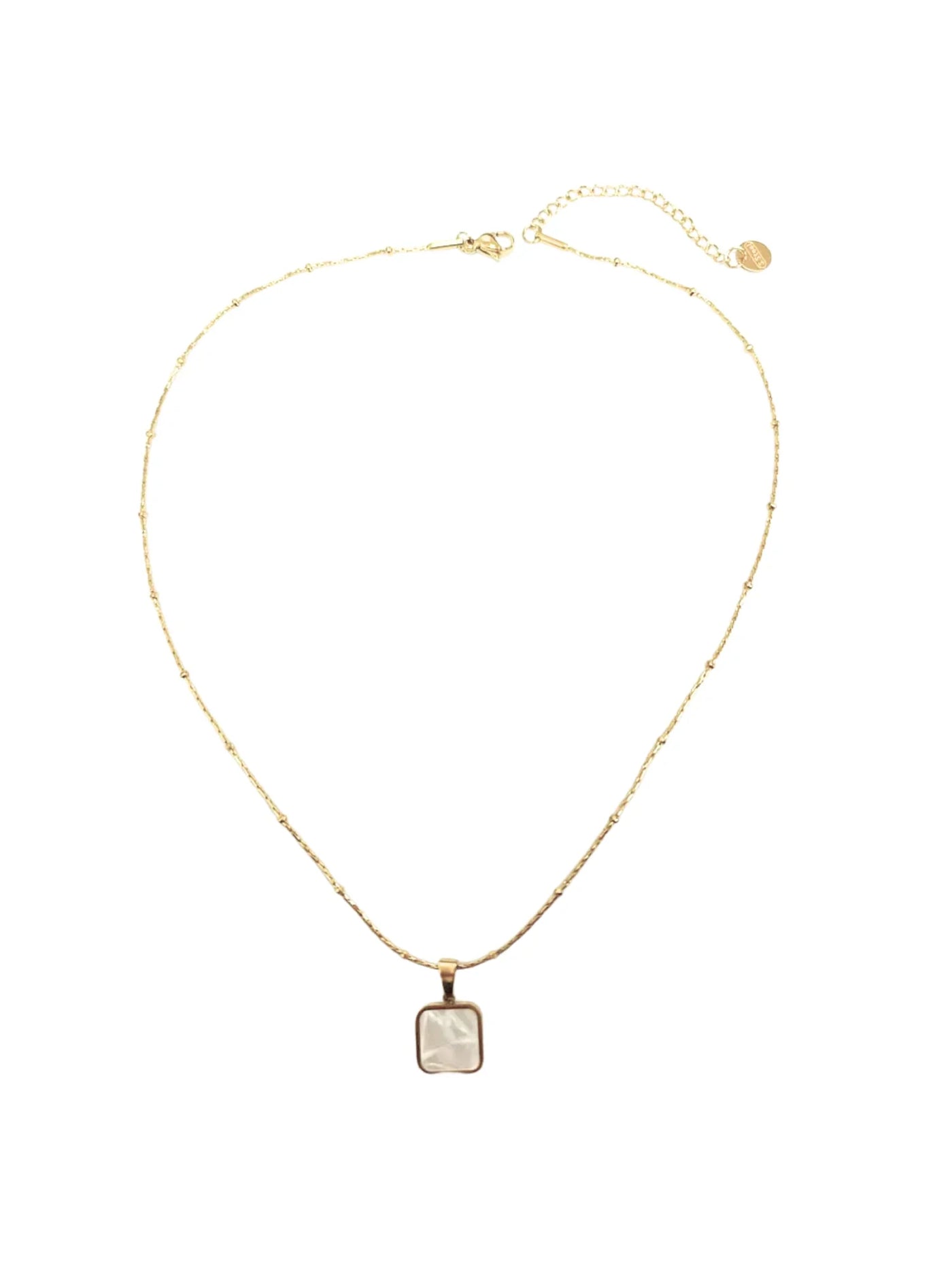 Gold necklace with a square pendant on a white background.