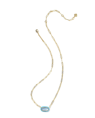 Gold necklace with a blue pendant on a white background.