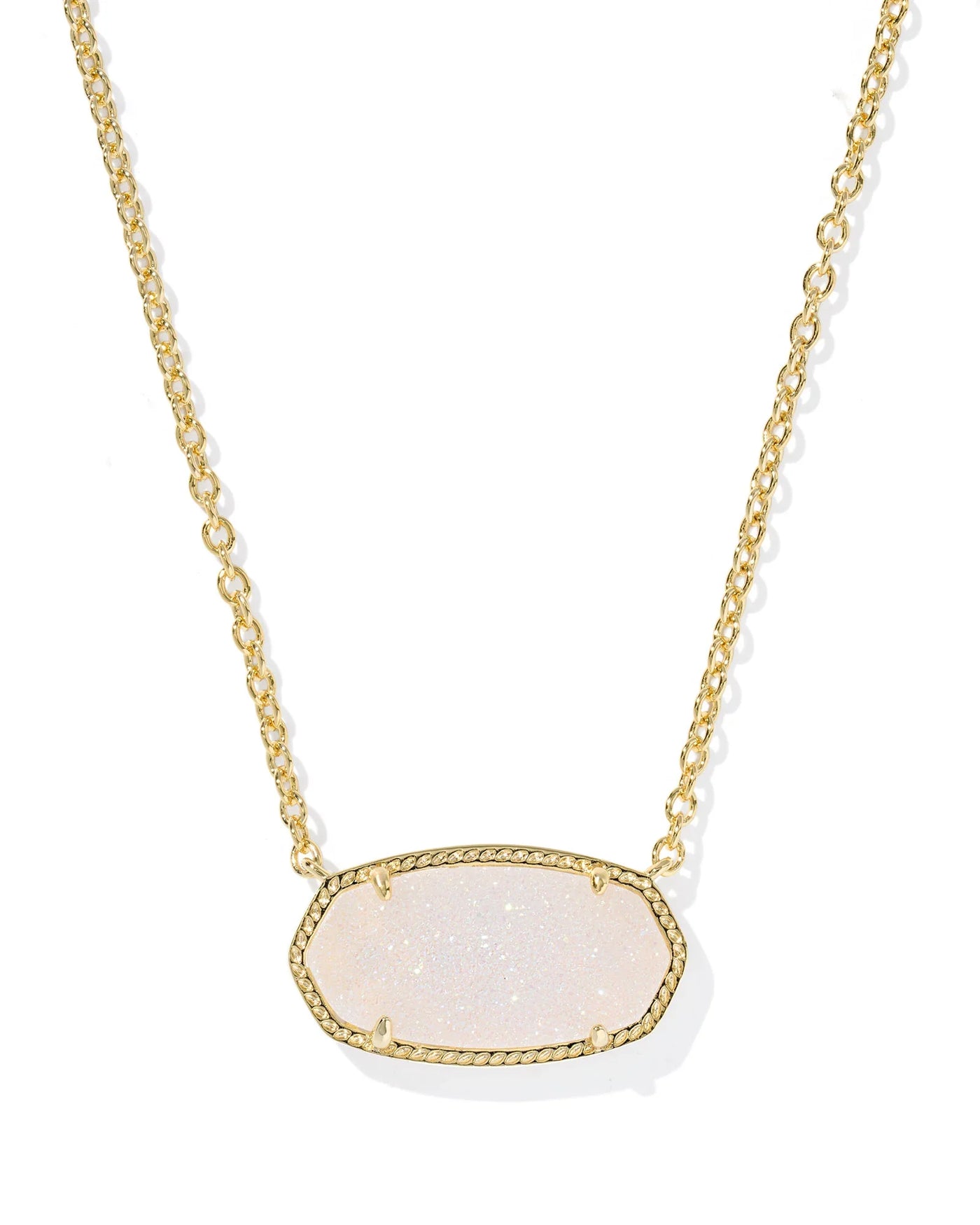 Gold necklace with a large iridescent drusy pendant against a white background, closeup.