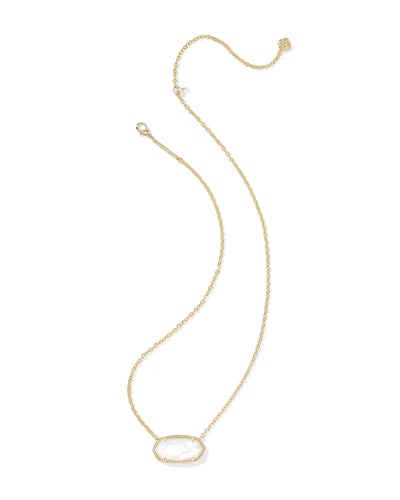 Gold necklace with a large mother of pearl pendant on a white background.