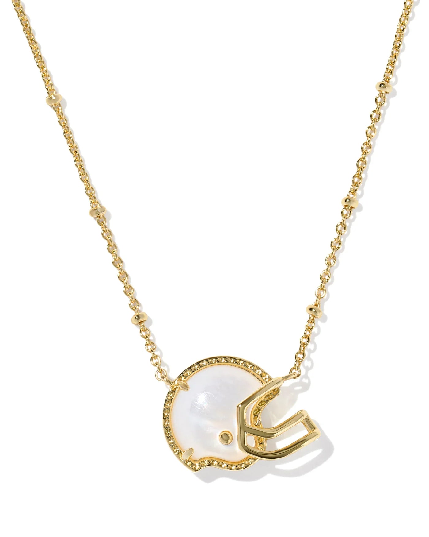 Gold necklace with a football helmet pendant on a white background, closeup.