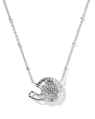 Silver necklace with a football helmet pendant from the back on a white background, closeup.