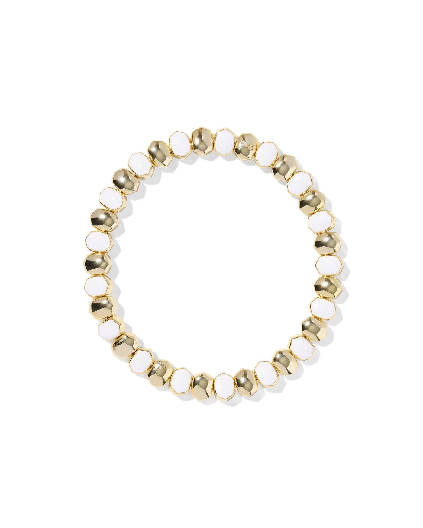 Gold and white beaded bracelet on a white background.