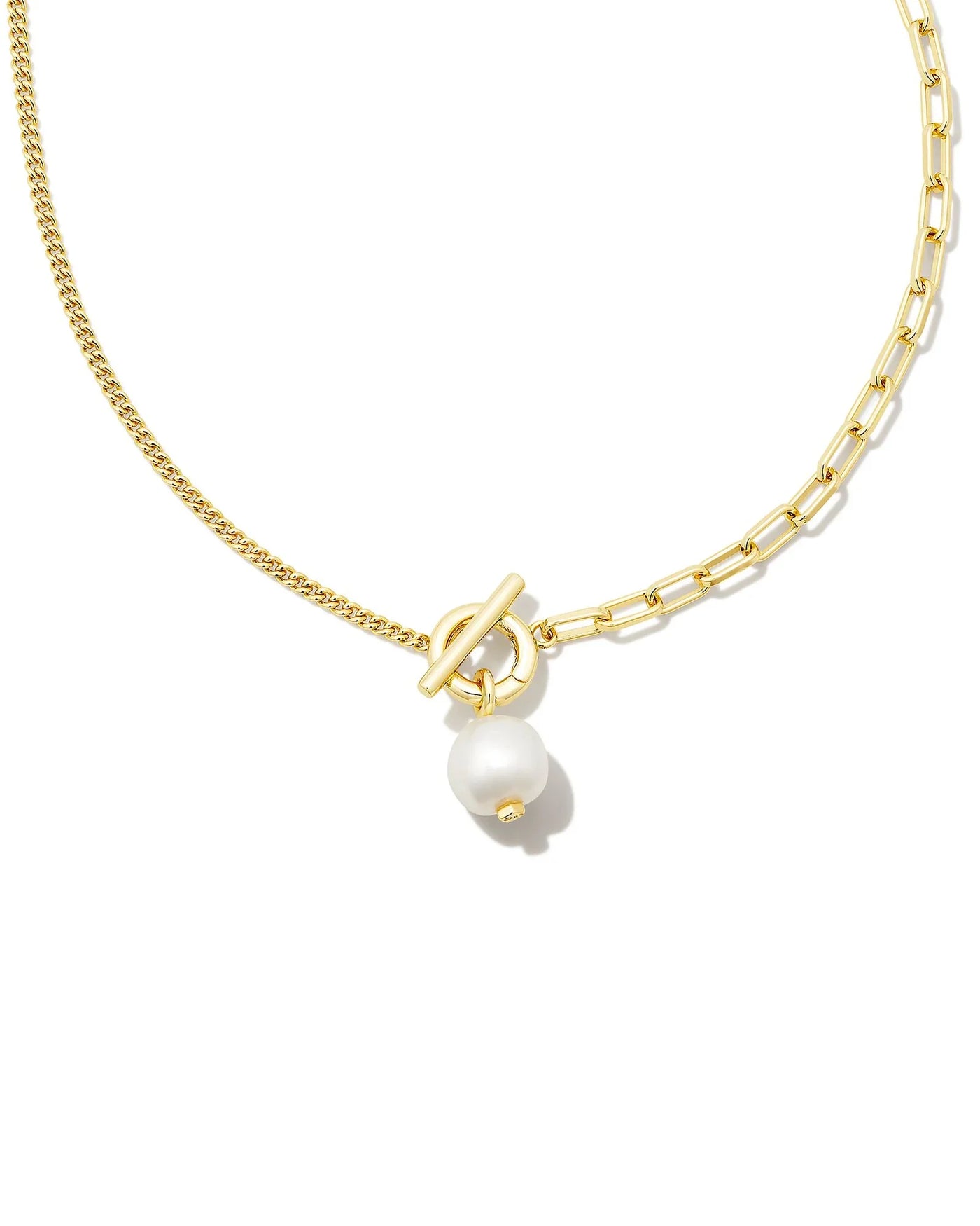 Gold necklace with a pearl pendant on a white background.