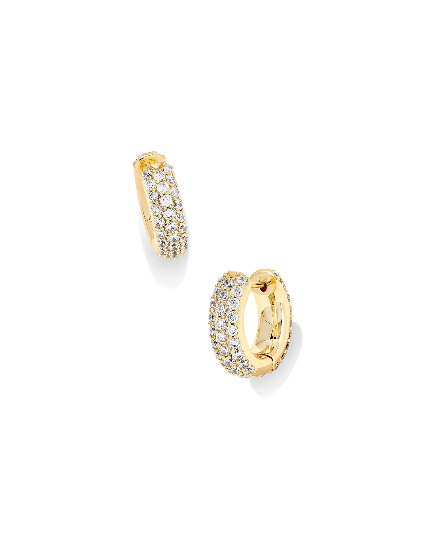 Gold hoop earrings with embedded stones on a white background.