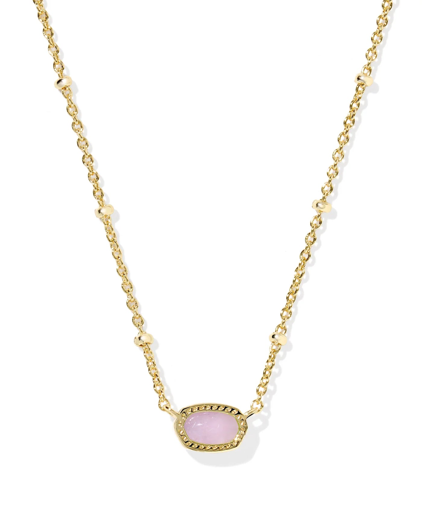Gold necklace with a purple pendant on a white background, closeup.