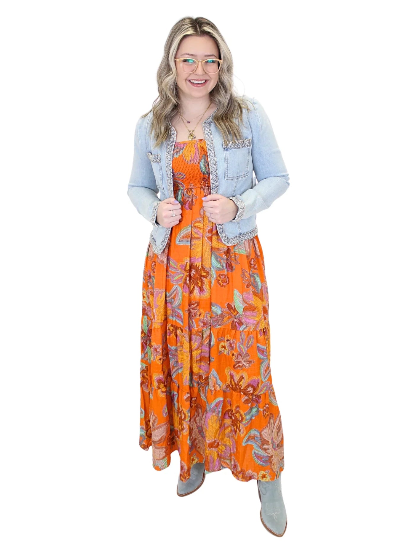 Light wash braided trim jean jacket on model, full front.