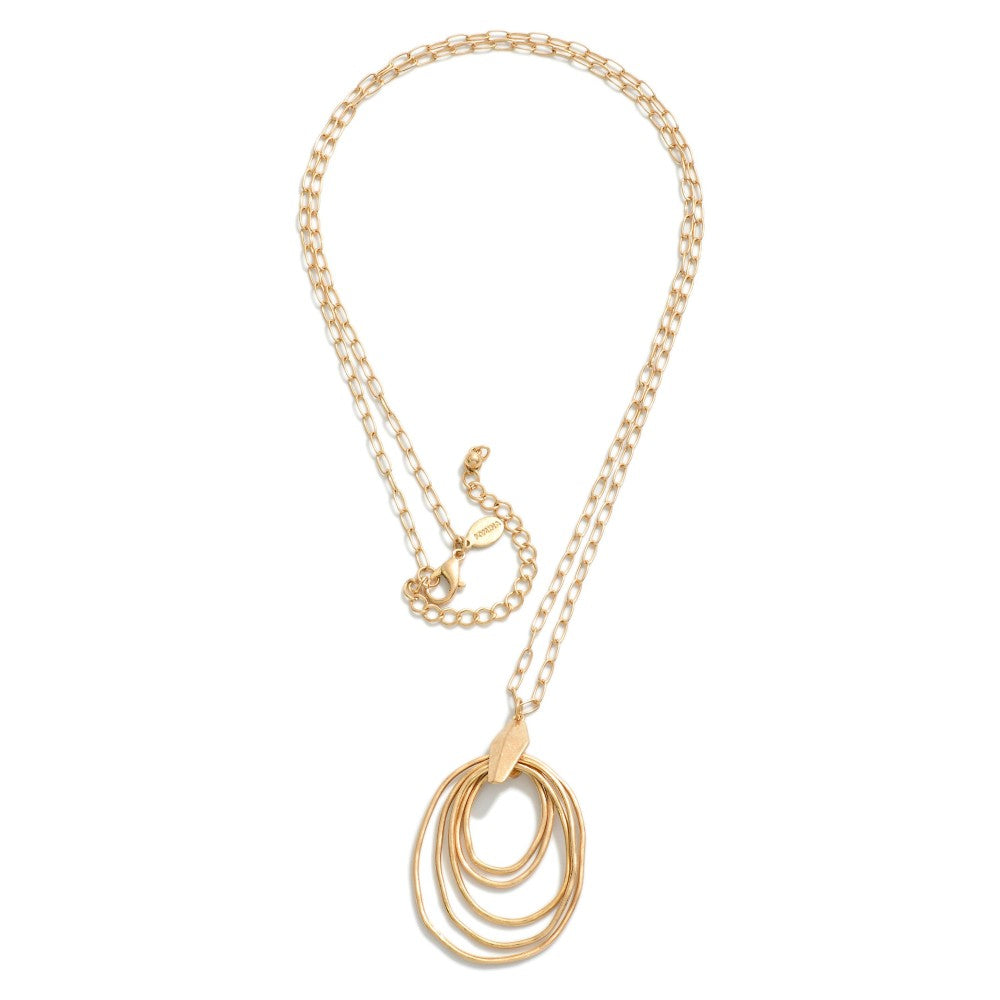 Long Chain Link Necklace with Nesting Pendant in Gold, front view.