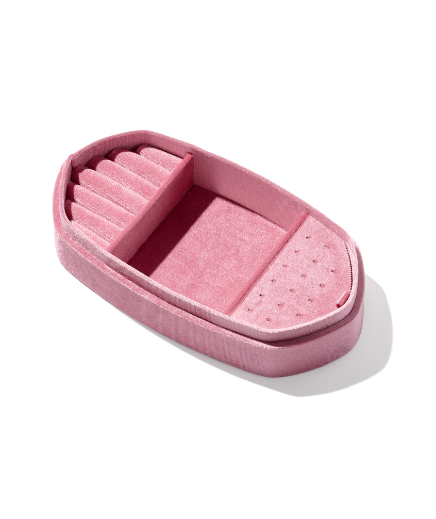 Pink jewelry box with compartments on a white background