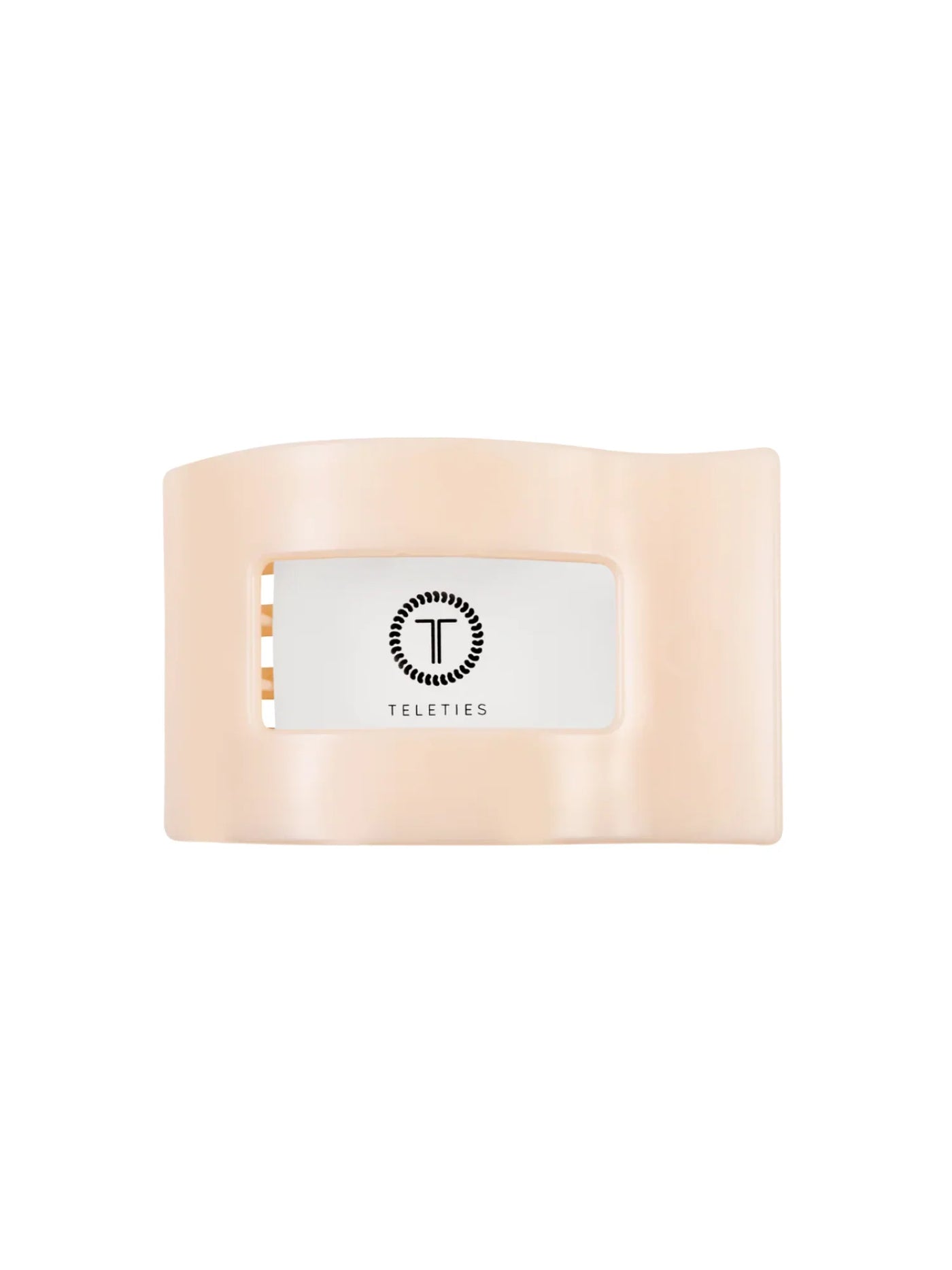 Packaged beige medium flat rectangle hair clip on white background, front.
