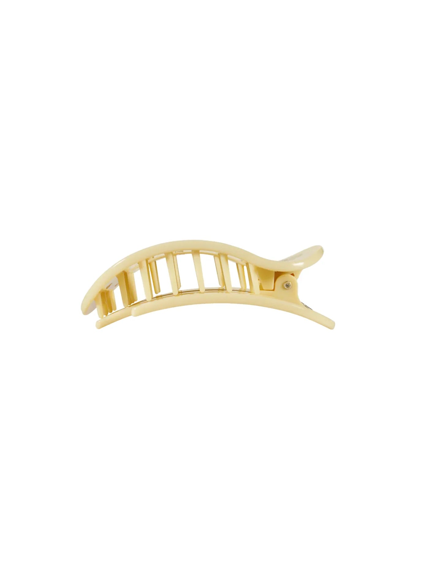 Small yellow round hair clip on white background, side.