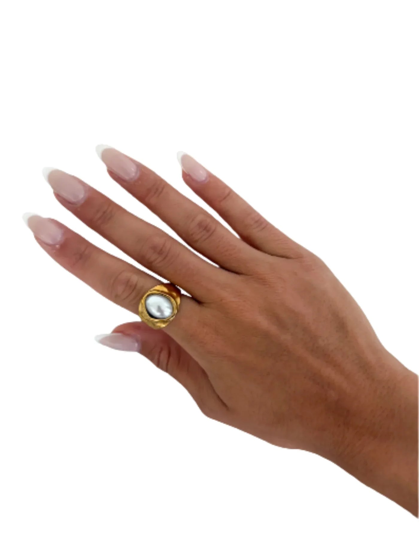 Hand wearing thick gold ring with pearl on white background.