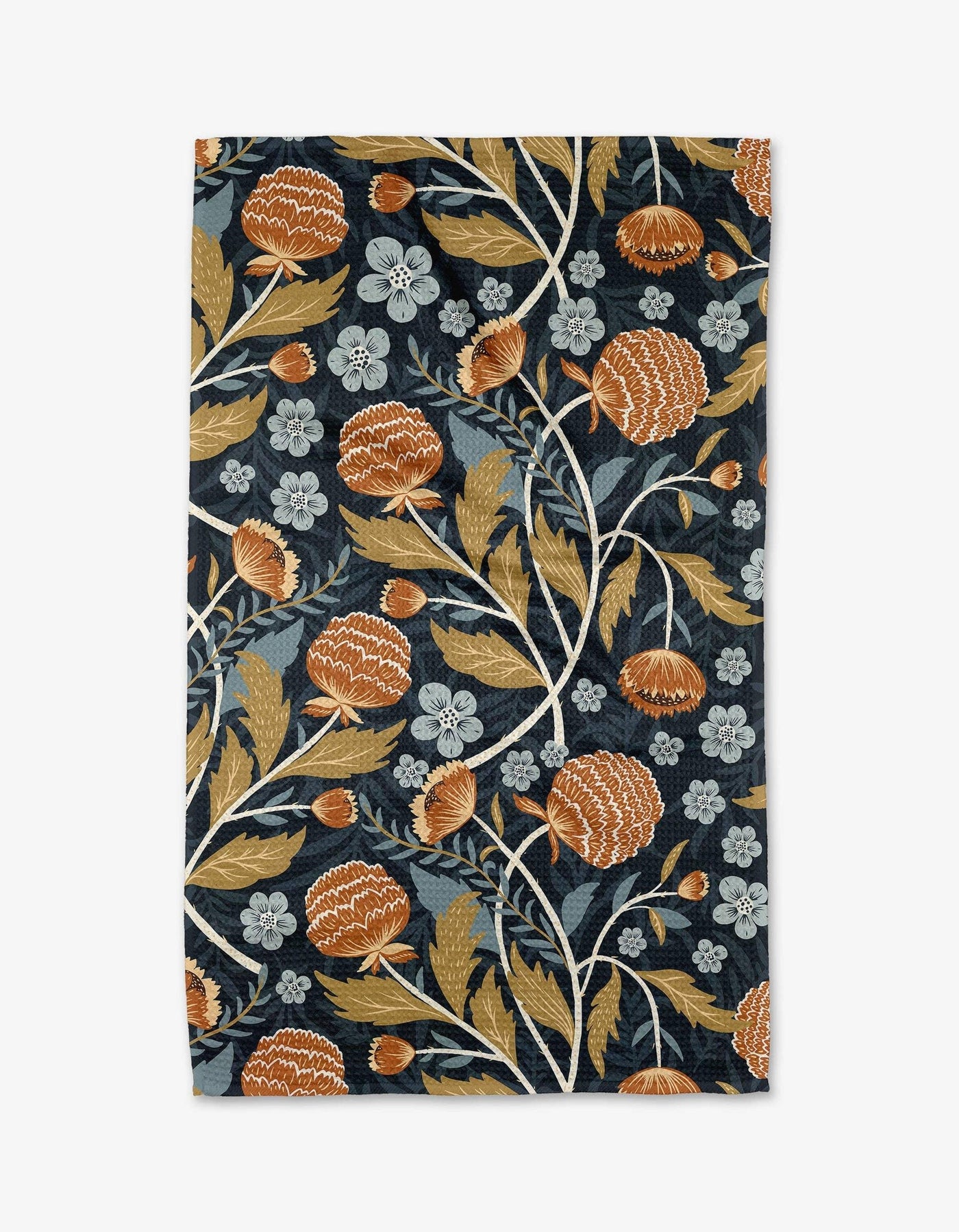 Floral patterned tea towel with orange, blue, and beige flowers on a dark blue background