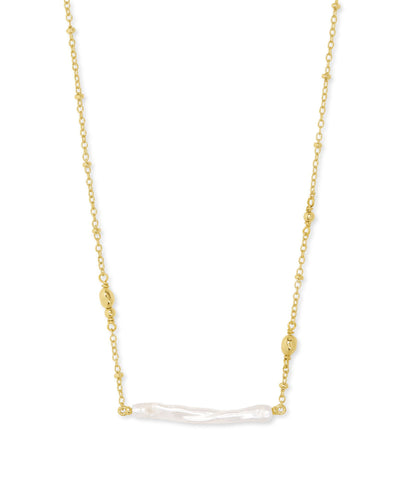 Kendra Scott Ellie Pendant Necklace in Gold on white background close up.