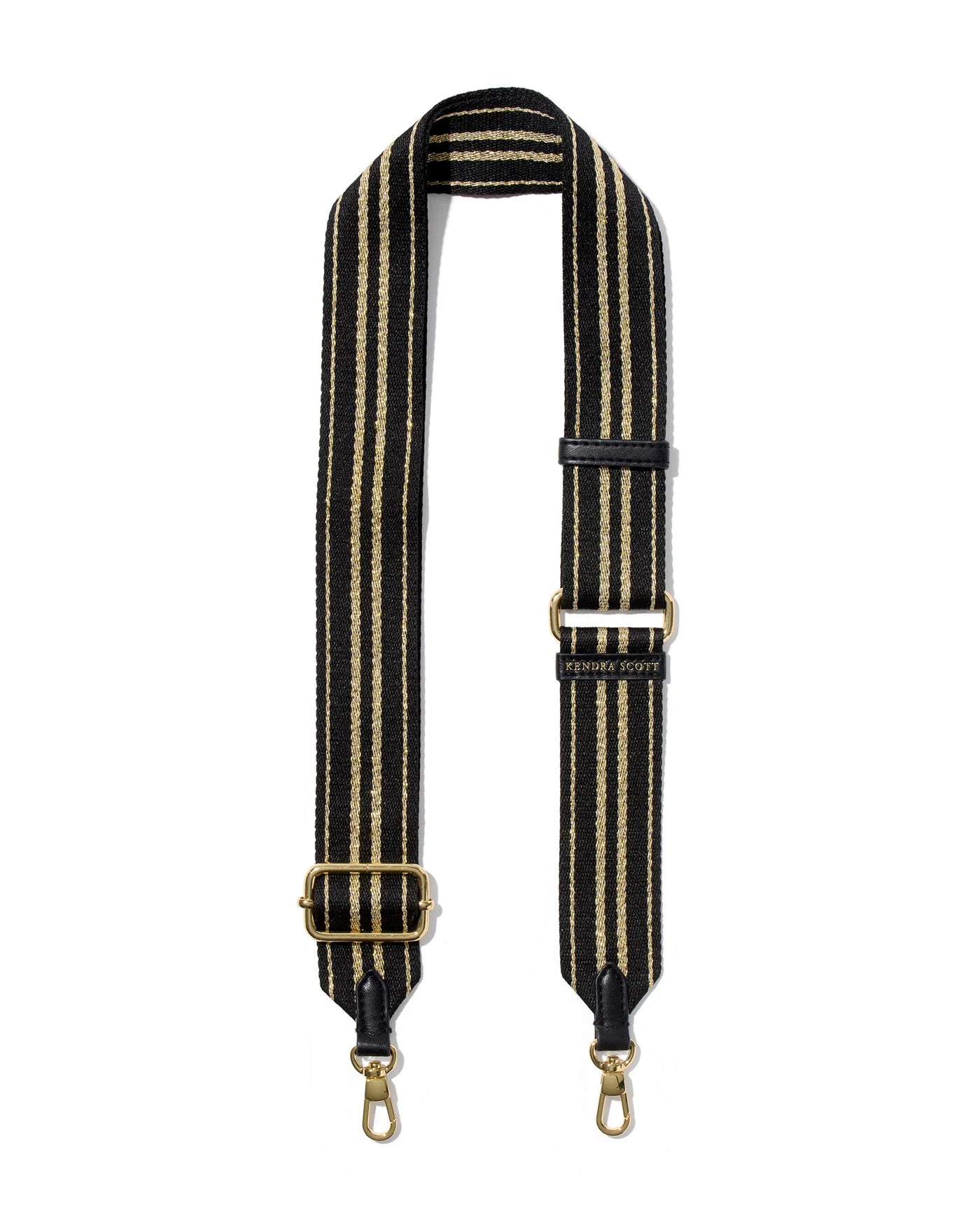 Striped bag strap with gold hardware on a white background.