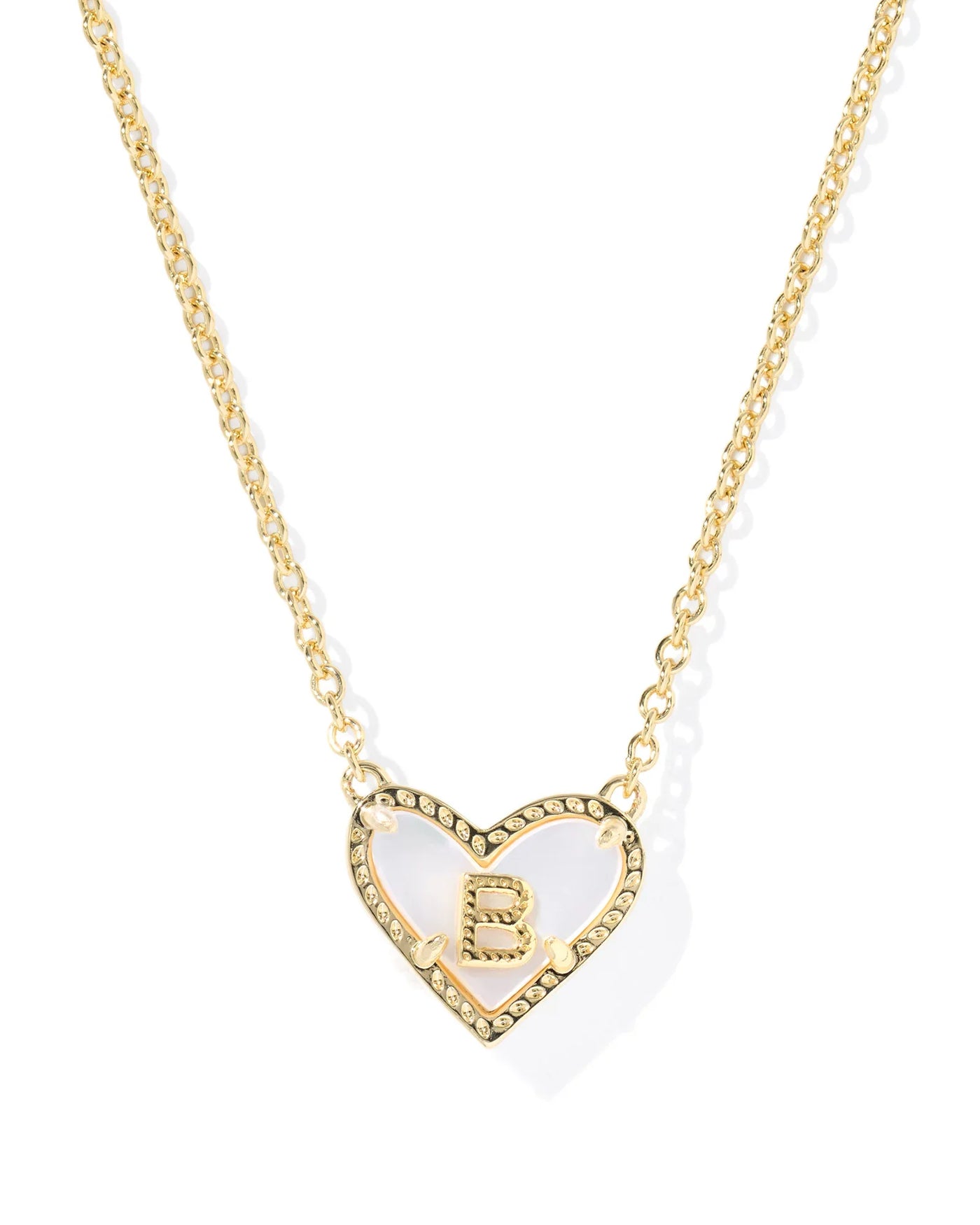 Heart-shaped necklace with a letter 'B' pendant on a white background.
