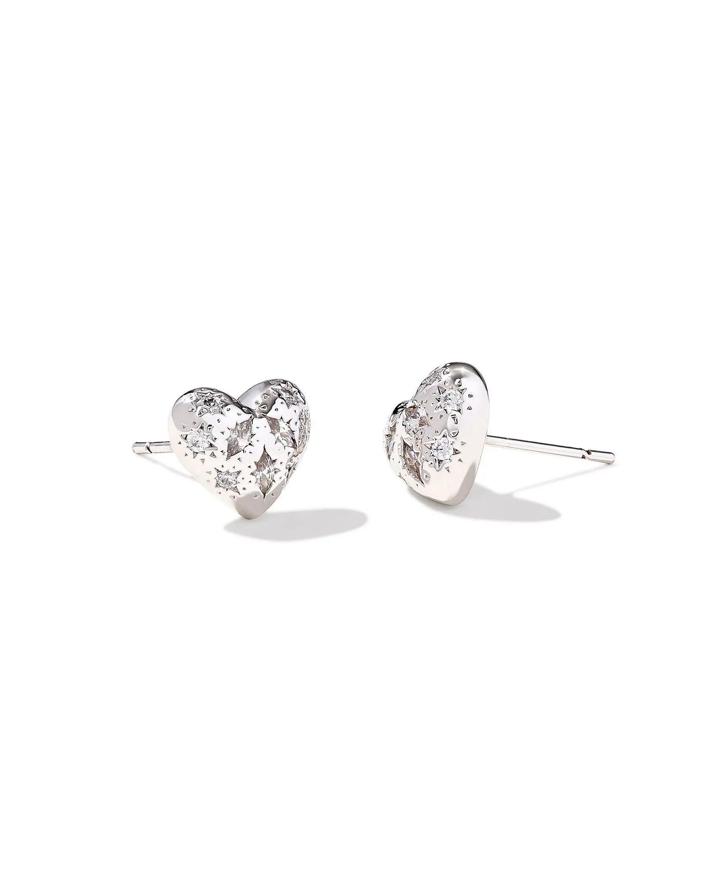 Small silver heart earrings with white crystal embellishments, front.