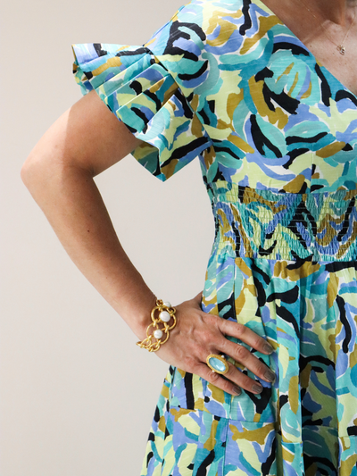 Lili Sidonio Jeanne Midi Dress up close waist and sleeve detail.