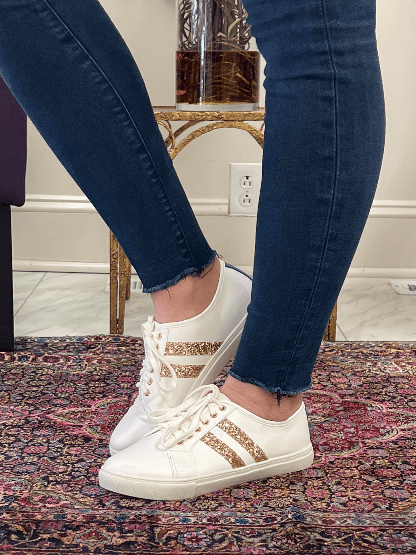 White sneakers with rose gold double line glitter accents