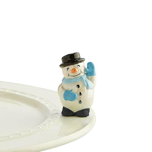 Tiny snowman with blue gloves and scarf and black boots and a top hat for decorating a Nora Fleming dish