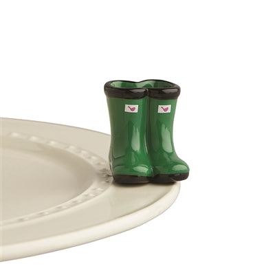 Green and black rain boots with the signature Nora  Fleming pink bird 